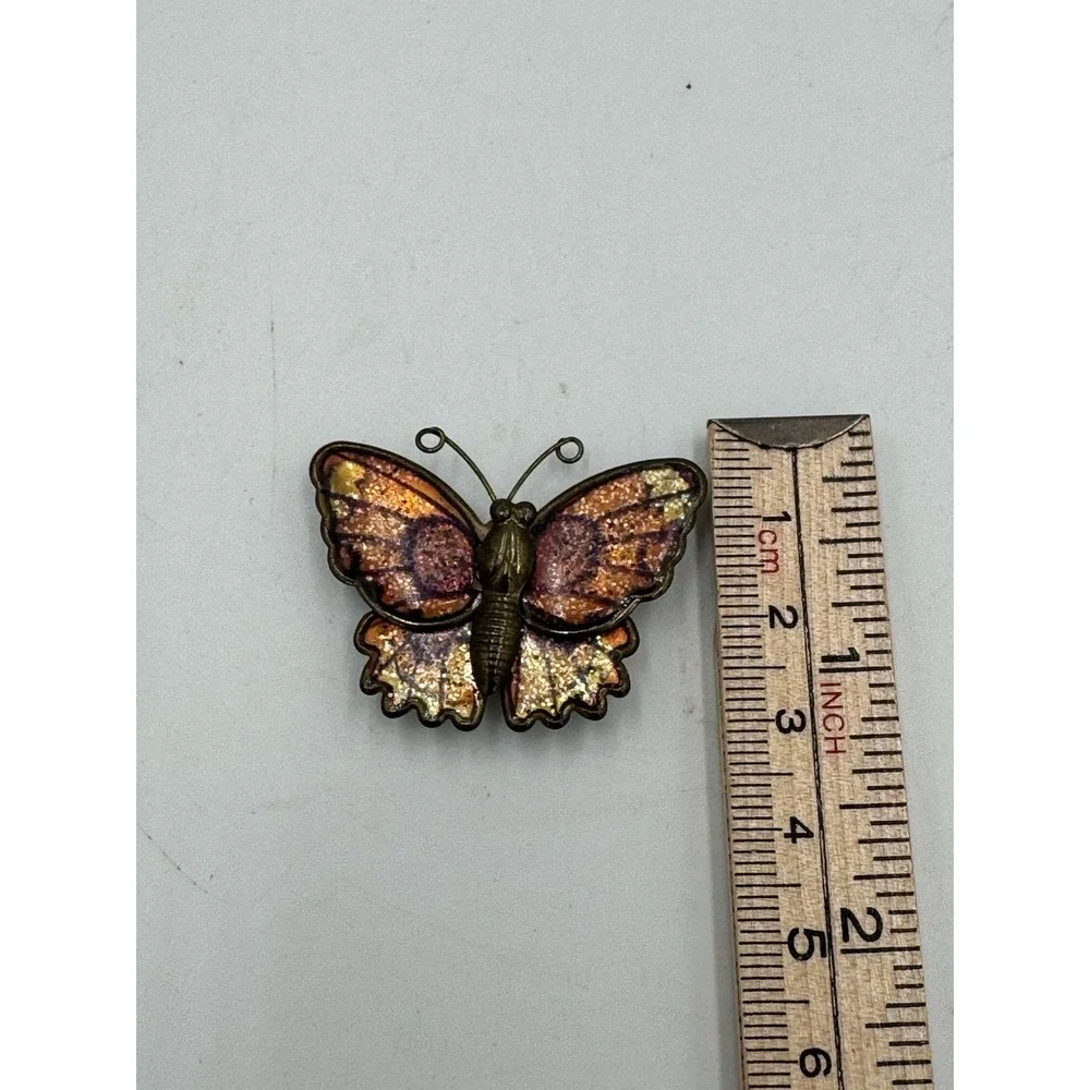 Vintage Fold Tone Butterfly Magnet With Glittery Orange & Purple Wings